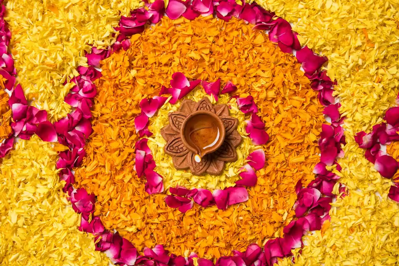 Diya and Flower Petal Rangoli Design